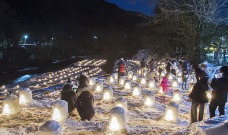 Enjoy the enchanting lights at the Yunishigawa Onsen Kamakura Snow House Festival